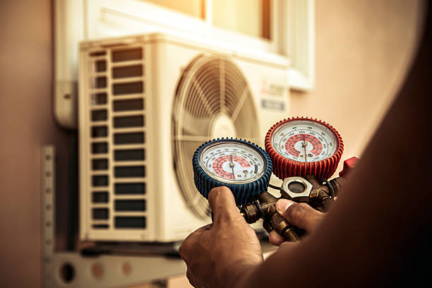 Professional Air Conditioning Service technician working in Oak View, CA